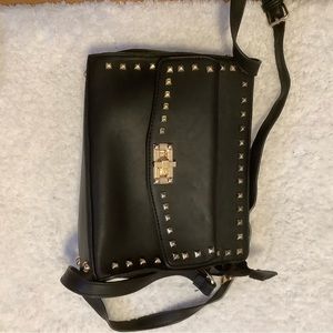 A medium shoulder strap purse.